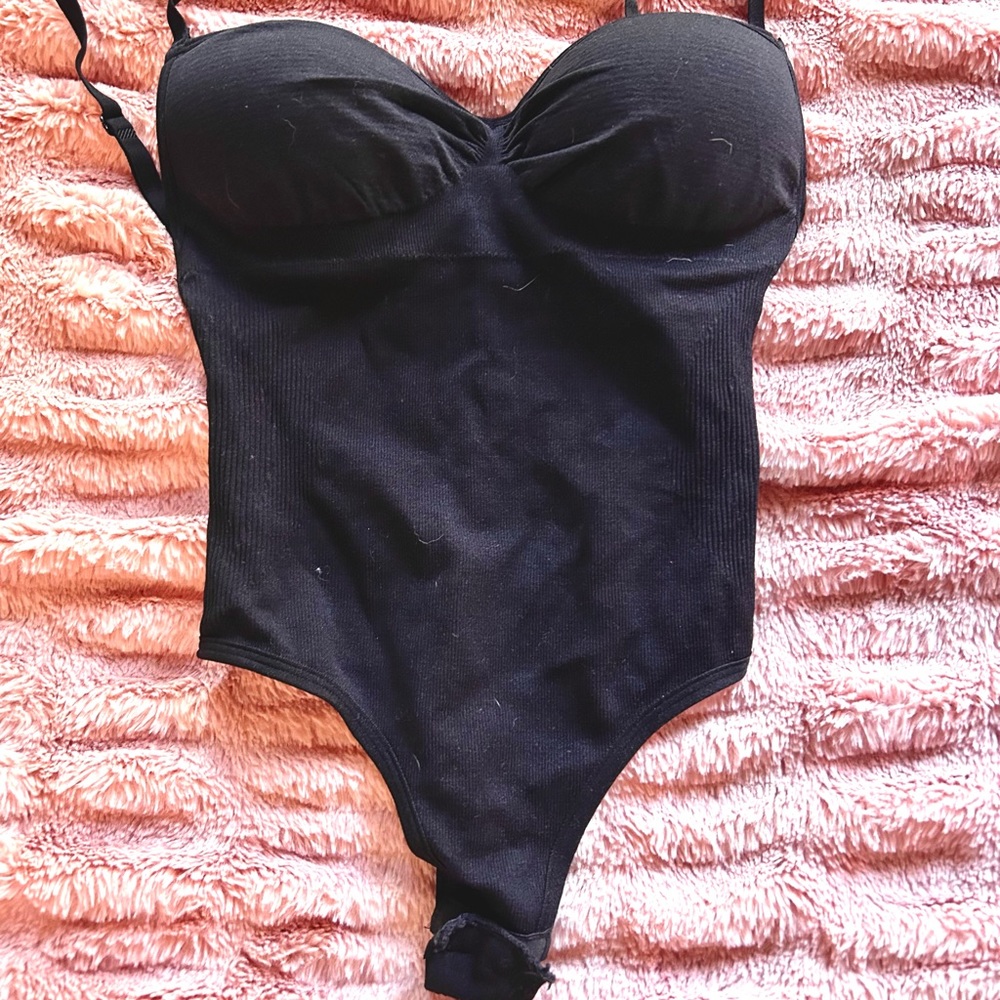 Shapeware form fitting black bodysuit